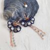 Bijou en crochet. Boucles d'oreille bleues marine réalisées en crochet. Brodées avec des perles de sable naturelle. Faites à la main et made in France